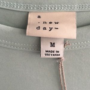 A new day shirt Medium light blue size med NEW